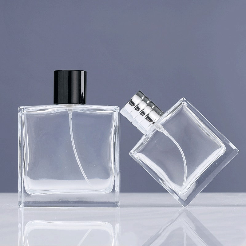 Botella de perfume de spray transparente de lujo de 50 ml y 100 ml