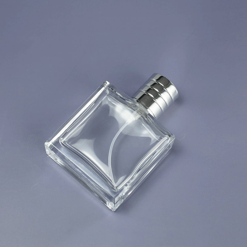 Botella de perfume de spray transparente de lujo de 50 ml y 100 ml